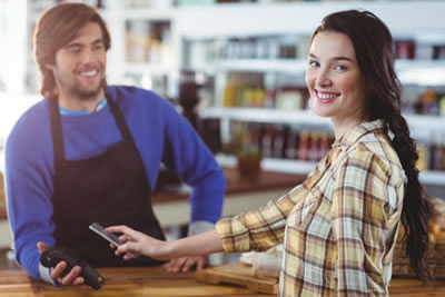 Person using smartphone for mobile payment - Digital Wallets